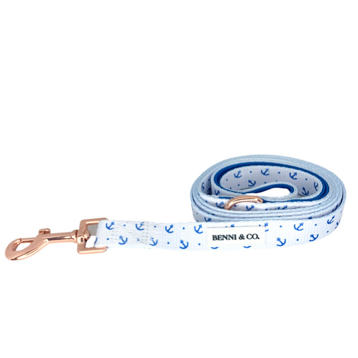 Anchors Aweigh dog leash featuring a soft neoprene padded handle and rose gold hardware, perfect for stylish walks and adventures.